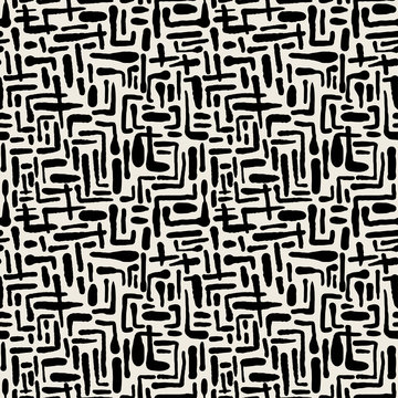 Seamless repeating textile ink brush strokes pattern in doodle grunge texture style.