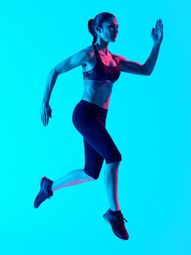 one mixed races woman runner running   isolated on blue blackground