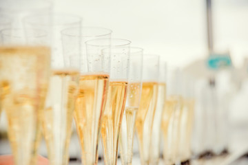 Full glass of champagne close up.