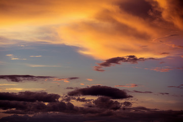 Colorful dramatic sky with cloud at sunset.Sky with sun background