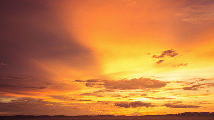 Colorful dramatic sky with cloud at sunset.Sky with sun background