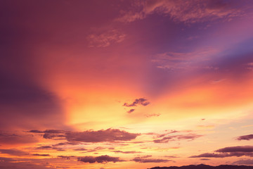 Obraz na płótnie Canvas Colorful dramatic sky with cloud at sunset.Sky with sun background