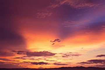 Colorful dramatic sky with cloud at sunset.Sky with sun background