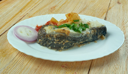 Boiled catfish, Romanian style.