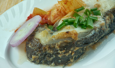 Boiled catfish, Romanian style.