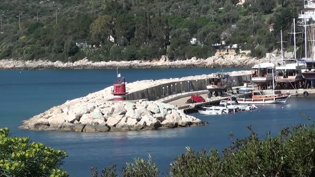 seaside town, harbor and lighthouse view, zoom out