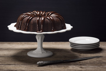 Dark Chocolate Bundt Cake with Ganache Icing on Cake Stand