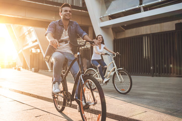 Romantic couple with bicycles in the city