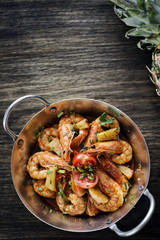 stir fry prawns in spicy asian pineapple and herbs sauce