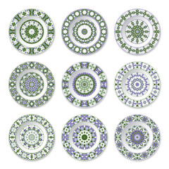 nine decorative plates with circular colored pattern - 158643043