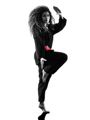 one caucasian woman practicing martial arts Kung Fu Pencak Silat in studio isolated on white...