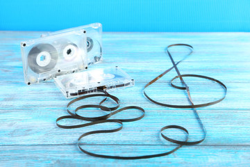 Cassette tapes on blue wooden table
