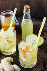 Cold ginger lemonade with lime and lemon.