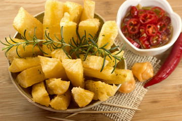Brazilian food mandioca frita. Deep fried cassava root.