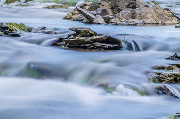 Background of Carpathian mountain river with long exposure