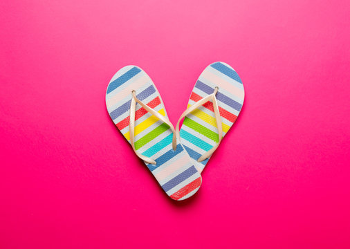 Above view at multicolor striped flip flops