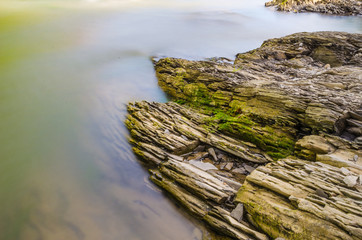 Background of Carpathian mountain river with long exposure