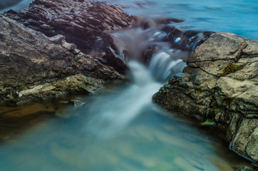Background of Carpathian mountain river with long exposure