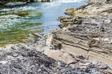 Background of Carpathian mountain river with long exposure