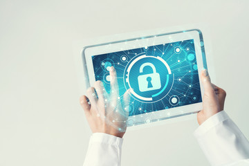 Close of female doctor hands working with tablet pc computer