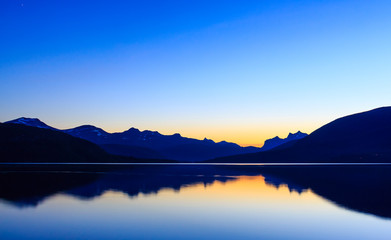 Distant mountains reflecting from the lake