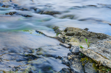 Fototapeta na wymiar Background of Carpathian mountain river with long exposure