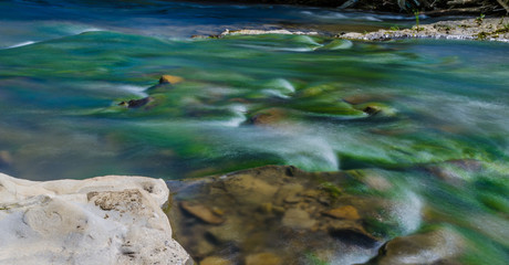 Background of Carpathian mountain river with long exposure