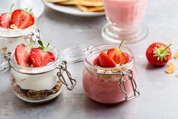 Healthy breakfast with natural greek yogurt, muesli and berries