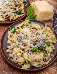 Creamy mushroom spinach pasta .