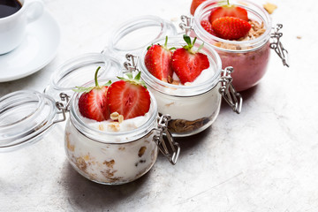 Healthy breakfast with natural greek yogurt, muesli and berries