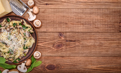 Creamy mushroom spinach pasta .