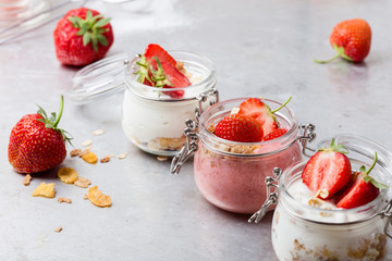 Healthy breakfast with natural greek yogurt, muesli and berries
