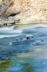 Background of Carpathian mountain river with long exposure
