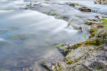 Background of Carpathian mountain river with long exposure