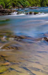 Background of Carpathian mountain river with long exposure