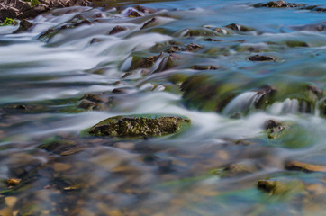 Background of Carpathian mountain river with long exposure