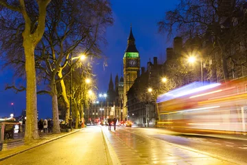 Foto op Plexiglas London cityscape at Big Ben, night scene photo with a red bus and traffic © Ioan Panaite