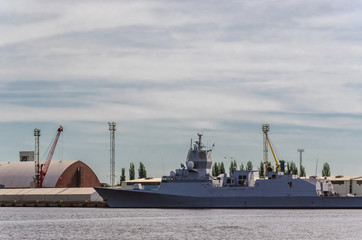 WARSHIP - A frigate at a civil port quay