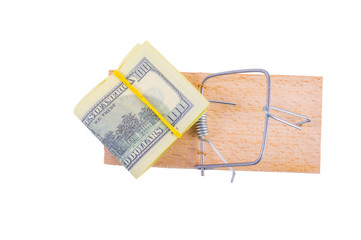Mousetrap with money on white background