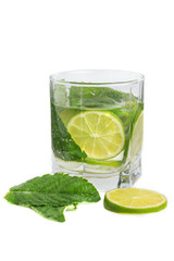 Refreshing drink with lime and mint on a white background