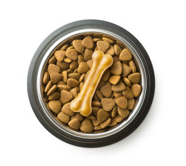 Dog chew bone and dry kibble dog food.