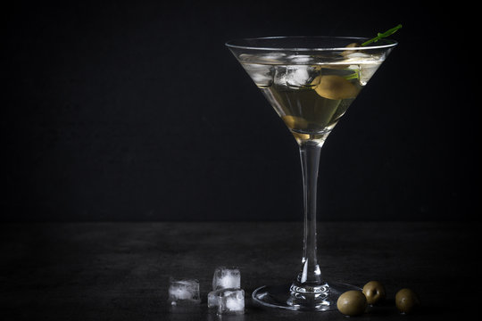 Martini cocktail on dark