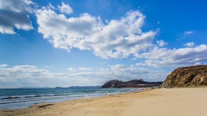 The sandy beach of the sea of Japan on the shores of the Primorsky territory