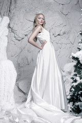 Fototapeta premium snow queen standing in ice cave
