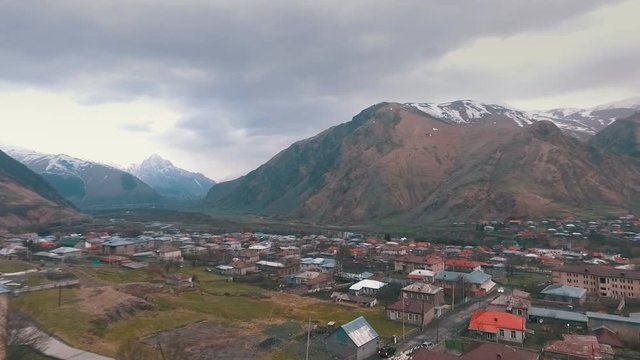 Gergeti christian church near Kazbegi, Stepancminda village in Georgia, Caucasus.