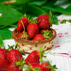 Ripe strawberries on wooden table. Fresh strawberries on wooden background