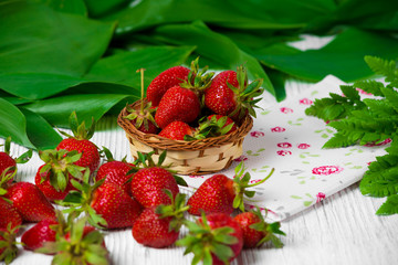 Ripe strawberries on wooden table. Fresh strawberries on wooden background