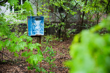 Abandoned blue mailbox in prypjat