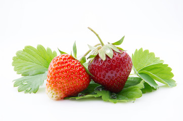 Ripe and juicy red strawberry berry isolated on a white background