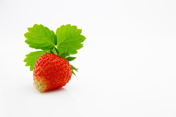 Ripe and juicy red strawberry berry isolated on a white background
